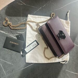 Versace Purple Medusa head clutch
